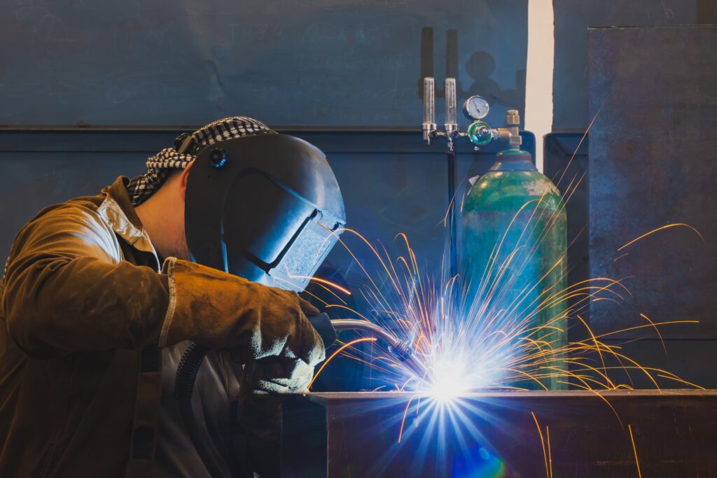 a machinist from Hamilton Machine Co. hard at work