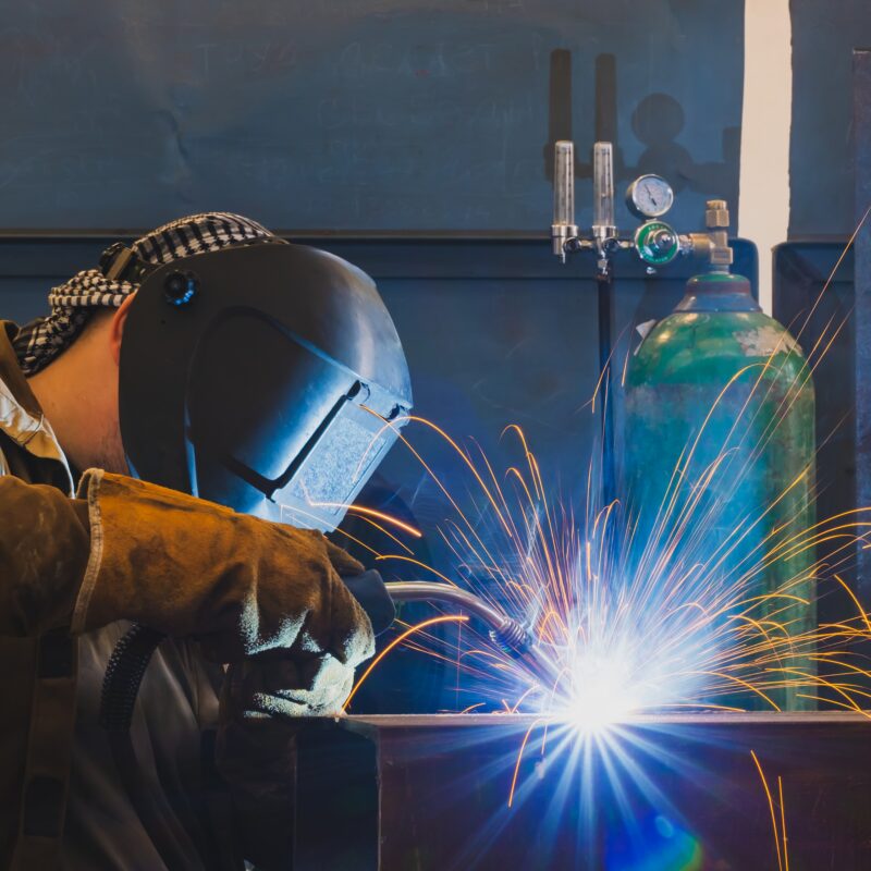 a machinist from Hamilton Machine Co. hard at work